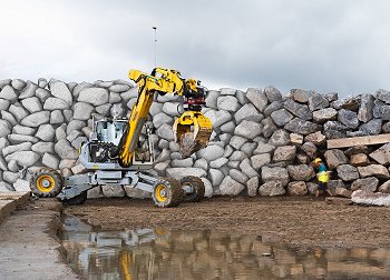 Trator robótico constrói muro de pedra sozinho, sem tratorista