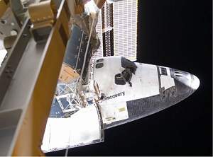 Discovery começa último dia na Estação Espacial Internacional